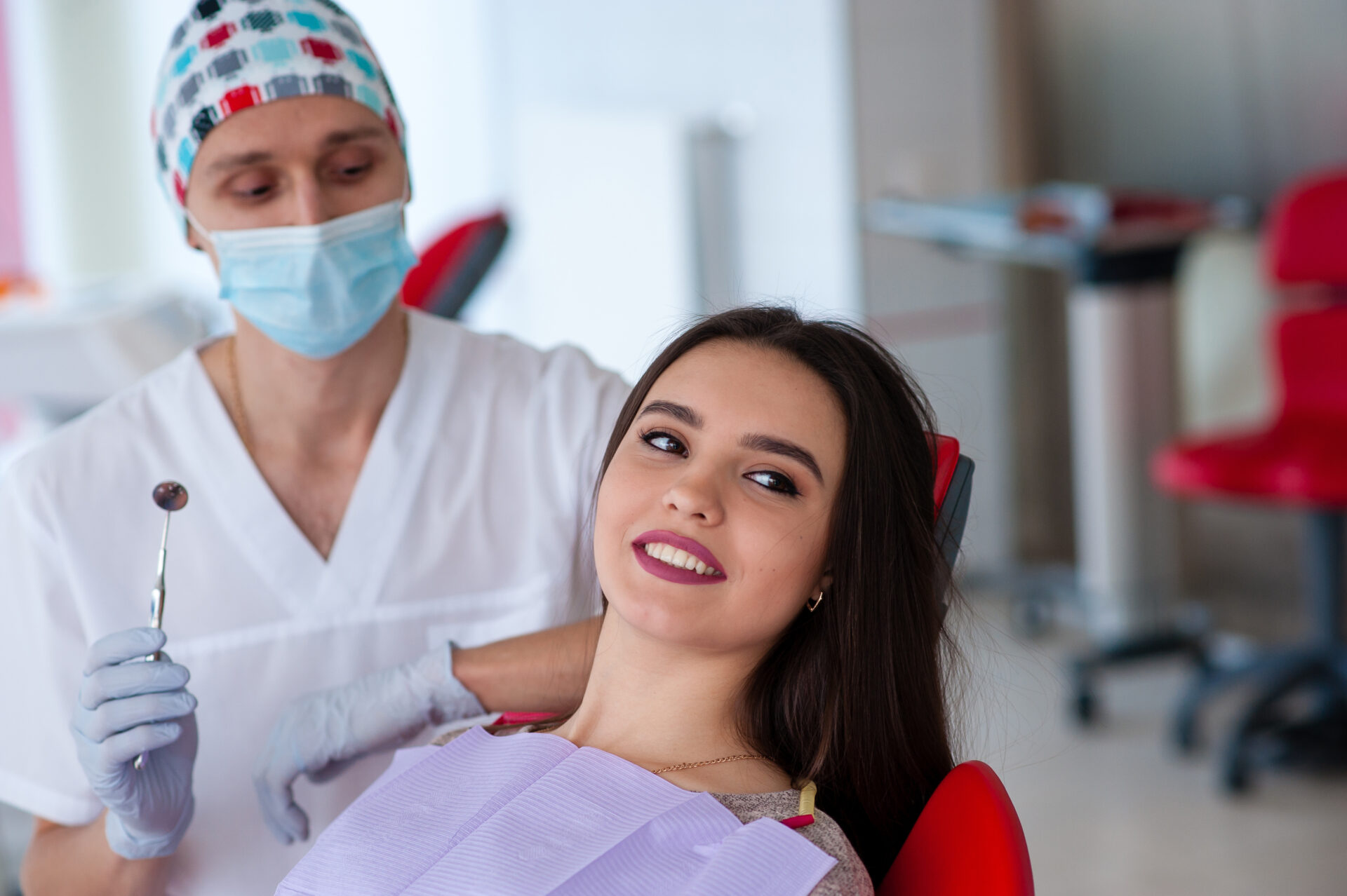 Portrait of a dentist and a beautiful girl in dentistry.